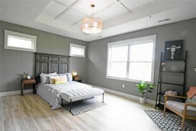 This stunning, Model Home and Parade Home, is a Platinum on Hunters Ridge Golf Course in Iowa - for sale on GolfHomes.com, golf home, golf lot