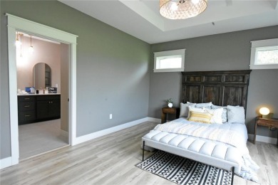 This stunning, Model Home and Parade Home, is a Platinum on Hunters Ridge Golf Course in Iowa - for sale on GolfHomes.com, golf home, golf lot