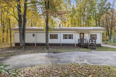 Remodeled in 2024, this 3-bedroom, 1-bath home in Lakes of the on Lakes of the North Deer Run Golf Course in Michigan - for sale on GolfHomes.com, golf home, golf lot