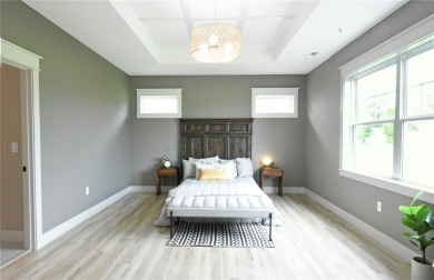 This stunning, Model Home and Parade Home, is a Platinum on Hunters Ridge Golf Course in Iowa - for sale on GolfHomes.com, golf home, golf lot