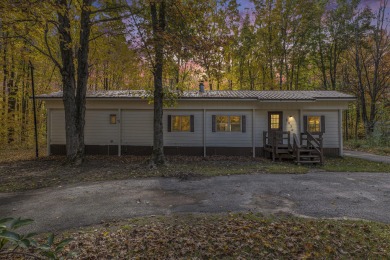 Remodeled in 2024, this 3-bedroom, 1-bath home in Lakes of the on Lakes of the North Deer Run Golf Course in Michigan - for sale on GolfHomes.com, golf home, golf lot