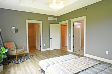 This stunning, Model Home and Parade Home, is a Platinum on Hunters Ridge Golf Course in Iowa - for sale on GolfHomes.com, golf home, golf lot
