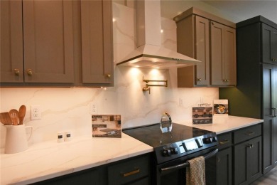 This stunning, Model Home and Parade Home, is a Platinum on Hunters Ridge Golf Course in Iowa - for sale on GolfHomes.com, golf home, golf lot