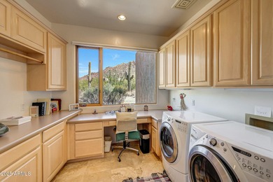 See this spectacular custom home in Glenn Moor at Troon Village on Troon Country Club in Arizona - for sale on GolfHomes.com, golf home, golf lot