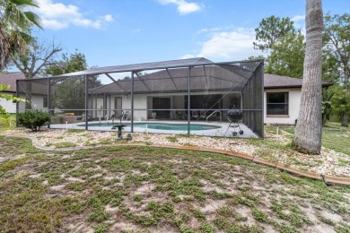Welcome to this spacious 3-bedroom, 2-bath pool home with nearly on Sugarmill Woods Golf and Country Club in Florida - for sale on GolfHomes.com, golf home, golf lot