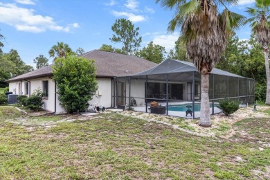 Welcome to this spacious 3-bedroom, 2-bath pool home with nearly on Sugarmill Woods Golf and Country Club in Florida - for sale on GolfHomes.com, golf home, golf lot