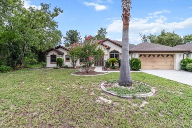 Welcome to this spacious 3-bedroom, 2-bath pool home with nearly on Sugarmill Woods Golf and Country Club in Florida - for sale on GolfHomes.com, golf home, golf lot