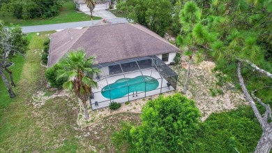 Welcome to this spacious 3-bedroom, 2-bath pool home with nearly on Sugarmill Woods Golf and Country Club in Florida - for sale on GolfHomes.com, golf home, golf lot