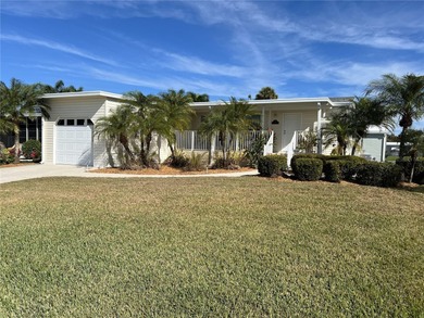 WHAT A GEM!  This 2 bedroom/2 bath abode is a Florida Gulf Coast on Imperial Lakewoods Golf Club in Florida - for sale on GolfHomes.com, golf home, golf lot