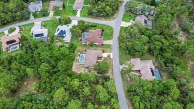 Welcome to this spacious 3-bedroom, 2-bath pool home with nearly on Sugarmill Woods Golf and Country Club in Florida - for sale on GolfHomes.com, golf home, golf lot