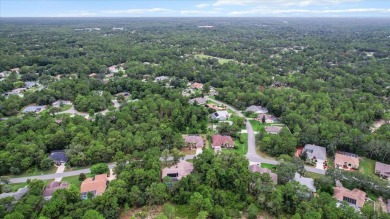 Welcome to this spacious 3-bedroom, 2-bath pool home with nearly on Sugarmill Woods Golf and Country Club in Florida - for sale on GolfHomes.com, golf home, golf lot
