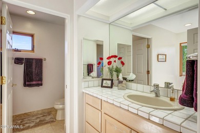 See this spectacular custom home in Glenn Moor at Troon Village on Troon Country Club in Arizona - for sale on GolfHomes.com, golf home, golf lot