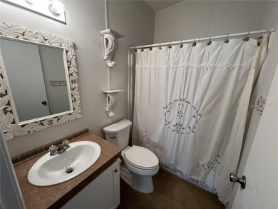 WHAT A GEM!  This 2 bedroom/2 bath abode is a Florida Gulf Coast on Imperial Lakewoods Golf Club in Florida - for sale on GolfHomes.com, golf home, golf lot