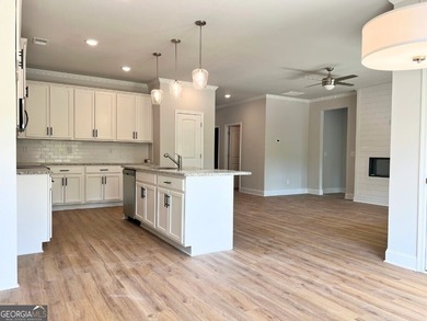 The Ellington Plan built by Stephen Elliott Homes. Quick on Chimney Oaks Golf Club in Georgia - for sale on GolfHomes.com, golf home, golf lot