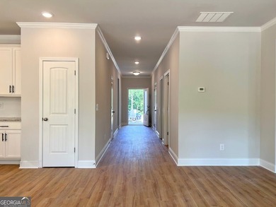 The Ellington Plan built by Stephen Elliott Homes. Quick on Chimney Oaks Golf Club in Georgia - for sale on GolfHomes.com, golf home, golf lot