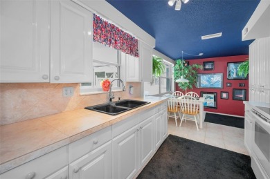 POOL HOME with a PRICE IMPROVEMENT! Bring OFFERS! This rare find on Forest Hills Golf Course in Florida - for sale on GolfHomes.com, golf home, golf lot