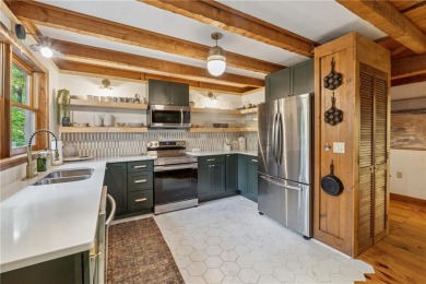 The cozy North Georgia cabin you've been searching for is here on Big Canoe Golf Club - Cherokee in Georgia - for sale on GolfHomes.com, golf home, golf lot