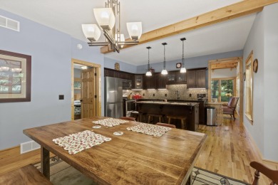 Experience year-round comfort and elegance in this like-new on Crystal Mountain Golf Course in Michigan - for sale on GolfHomes.com, golf home, golf lot
