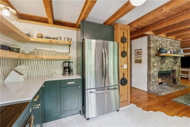 The cozy North Georgia cabin you've been searching for is here on Big Canoe Golf Club - Cherokee in Georgia - for sale on GolfHomes.com, golf home, golf lot