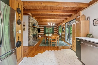 The cozy North Georgia cabin you've been searching for is here on Big Canoe Golf Club - Cherokee in Georgia - for sale on GolfHomes.com, golf home, golf lot