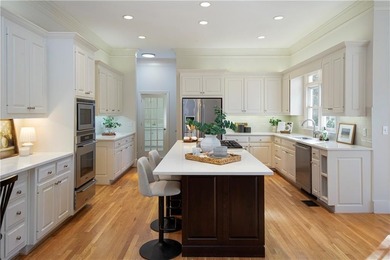 Quality craftsmanship, timeless style, and thoughtful on The Golf Club of Georgia in Georgia - for sale on GolfHomes.com, golf home, golf lot