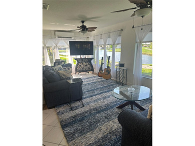 Rare Opportunity: Stunning Remodeled Sheffield in Gated Kings on Kings Gate Golf Club in Florida - for sale on GolfHomes.com, golf home, golf lot