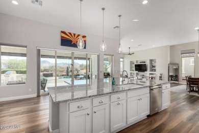 Located along the golf course with breathtaking mountain views on Copper Canyon Golf Club in Arizona - for sale on GolfHomes.com, golf home, golf lot