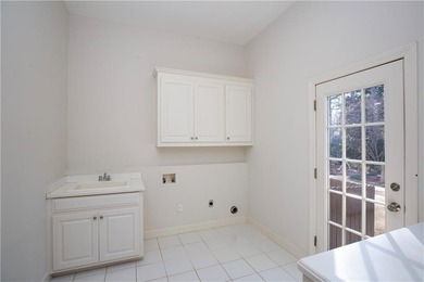 Quality craftsmanship, timeless style, and thoughtful on The Golf Club of Georgia in Georgia - for sale on GolfHomes.com, golf home, golf lot