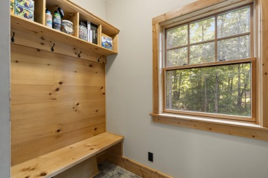 Experience year-round comfort and elegance in this like-new on Crystal Mountain Golf Course in Michigan - for sale on GolfHomes.com, golf home, golf lot