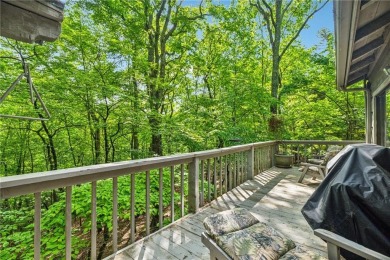 The cozy North Georgia cabin you've been searching for is here on Big Canoe Golf Club - Cherokee in Georgia - for sale on GolfHomes.com, golf home, golf lot
