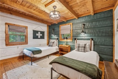 The cozy North Georgia cabin you've been searching for is here on Big Canoe Golf Club - Cherokee in Georgia - for sale on GolfHomes.com, golf home, golf lot