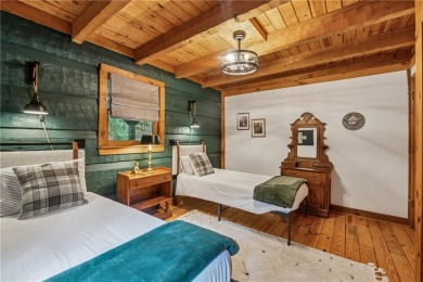 The cozy North Georgia cabin you've been searching for is here on Big Canoe Golf Club - Cherokee in Georgia - for sale on GolfHomes.com, golf home, golf lot