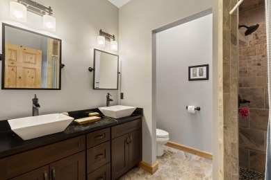 Experience year-round comfort and elegance in this like-new on Crystal Mountain Golf Course in Michigan - for sale on GolfHomes.com, golf home, golf lot