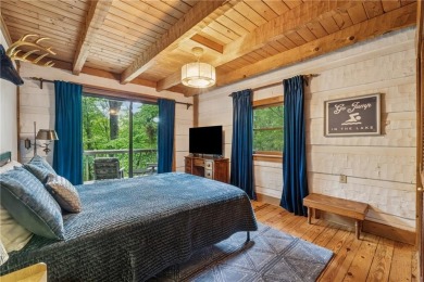The cozy North Georgia cabin you've been searching for is here on Big Canoe Golf Club - Cherokee in Georgia - for sale on GolfHomes.com, golf home, golf lot