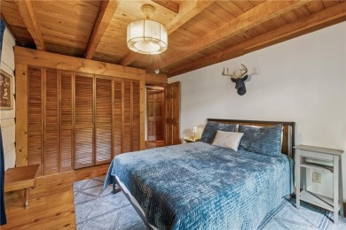 The cozy North Georgia cabin you've been searching for is here on Big Canoe Golf Club - Cherokee in Georgia - for sale on GolfHomes.com, golf home, golf lot