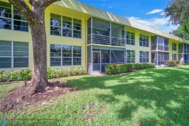 Step into this stunning first-floor unit in the highly on Palm-Aire Country Club and Resort - The Oaks in Florida - for sale on GolfHomes.com, golf home, golf lot