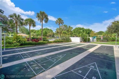 Step into this stunning first-floor unit in the highly on Palm-Aire Country Club and Resort - The Oaks in Florida - for sale on GolfHomes.com, golf home, golf lot