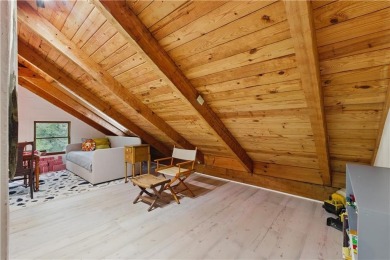 The cozy North Georgia cabin you've been searching for is here on Big Canoe Golf Club - Cherokee in Georgia - for sale on GolfHomes.com, golf home, golf lot