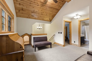 Experience year-round comfort and elegance in this like-new on Crystal Mountain Golf Course in Michigan - for sale on GolfHomes.com, golf home, golf lot