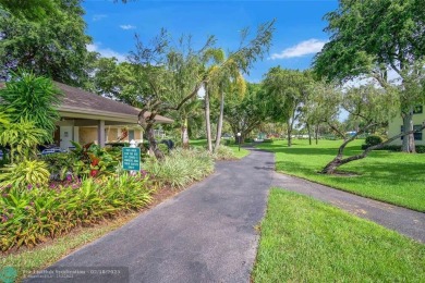 Step into this stunning first-floor unit in the highly on Palm-Aire Country Club and Resort - The Oaks in Florida - for sale on GolfHomes.com, golf home, golf lot