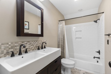 Experience year-round comfort and elegance in this like-new on Crystal Mountain Golf Course in Michigan - for sale on GolfHomes.com, golf home, golf lot