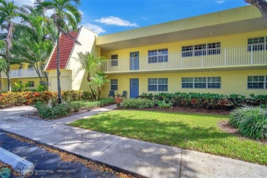 Step into this stunning first-floor unit in the highly on Palm-Aire Country Club and Resort - The Oaks in Florida - for sale on GolfHomes.com, golf home, golf lot