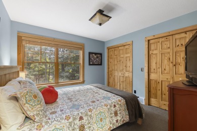Experience year-round comfort and elegance in this like-new on Crystal Mountain Golf Course in Michigan - for sale on GolfHomes.com, golf home, golf lot