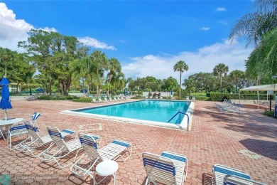 Step into this stunning first-floor unit in the highly on Palm-Aire Country Club and Resort - The Oaks in Florida - for sale on GolfHomes.com, golf home, golf lot