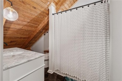 The cozy North Georgia cabin you've been searching for is here on Big Canoe Golf Club - Cherokee in Georgia - for sale on GolfHomes.com, golf home, golf lot