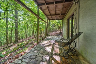 The cozy North Georgia cabin you've been searching for is here on Big Canoe Golf Club - Cherokee in Georgia - for sale on GolfHomes.com, golf home, golf lot
