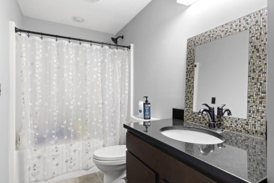 Experience year-round comfort and elegance in this like-new on Crystal Mountain Golf Course in Michigan - for sale on GolfHomes.com, golf home, golf lot