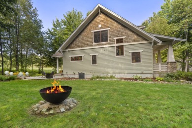 Experience year-round comfort and elegance in this like-new on Crystal Mountain Golf Course in Michigan - for sale on GolfHomes.com, golf home, golf lot