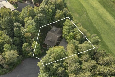 Experience year-round comfort and elegance in this like-new on Crystal Mountain Golf Course in Michigan - for sale on GolfHomes.com, golf home, golf lot