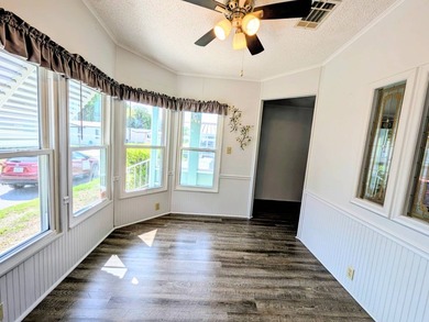 Welcome to this beautifully maintained and thoughtfully updated on Grasslands Golf and Country Club in Florida - for sale on GolfHomes.com, golf home, golf lot